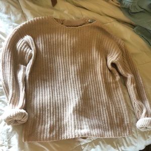 Cable knit light pink sweater with back detail